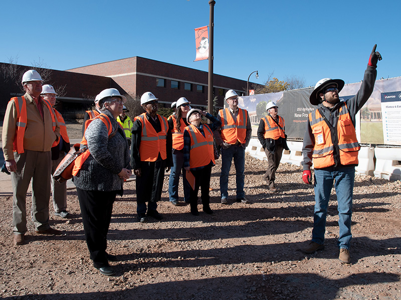 Dean's Advisory Council looking at construction site