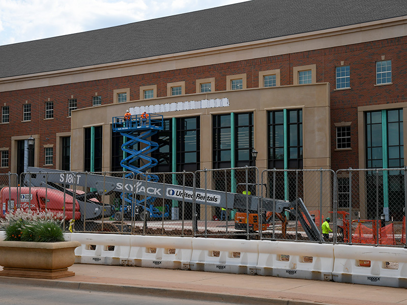 Lettering template on front of new building