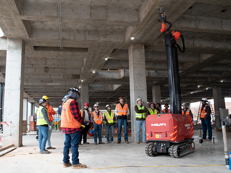 OSU-IT students get a demo of the JAIBOT robot