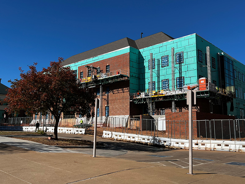 Brickwork wrapping around to the back of the building