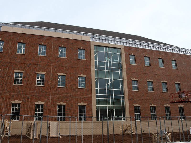 Adding stone to building