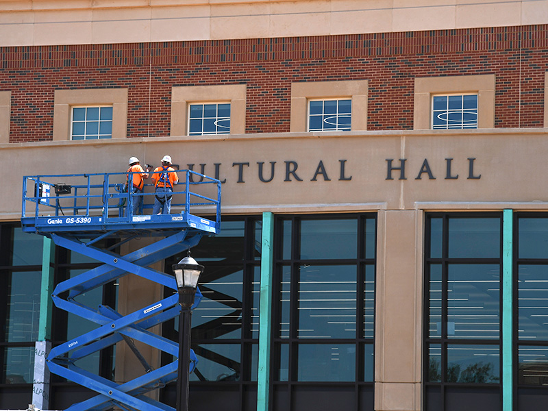 Agricultural Hall letters being installed on new building