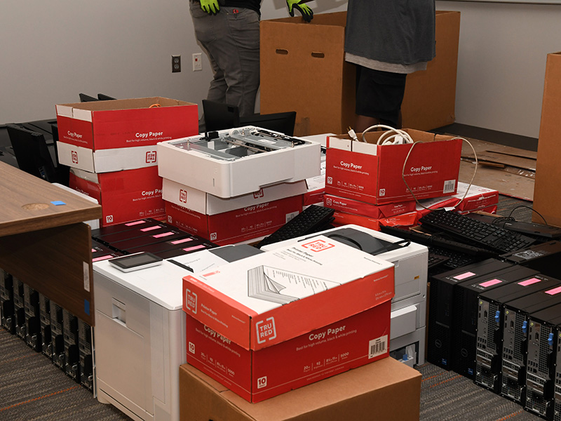 Boxes with computer equipment in computer lab