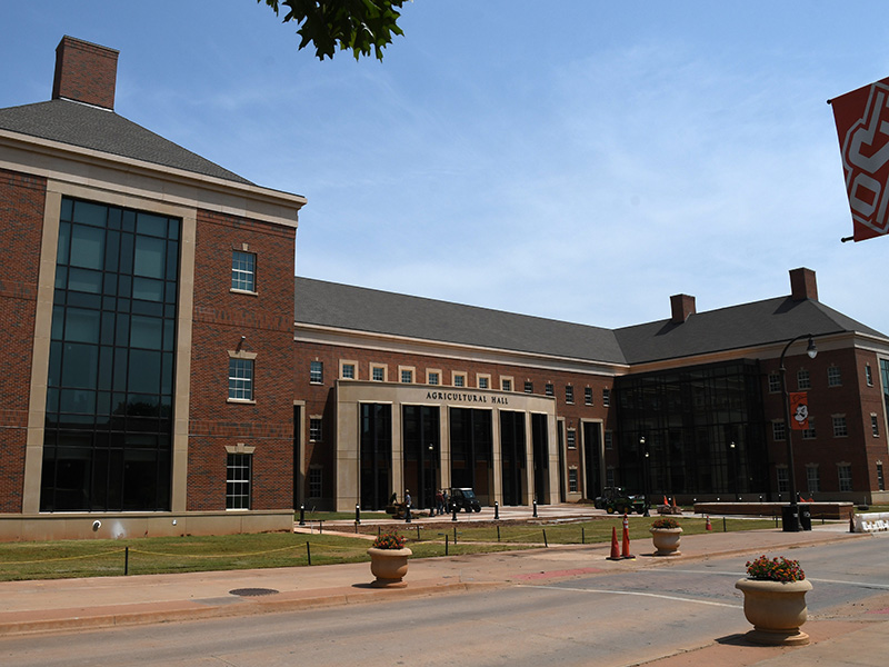View of new building with OSU street sign