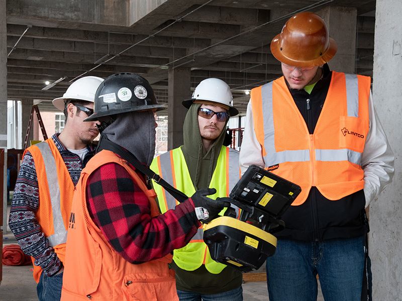 OSU-IT students learn how to operate JAIBOT robot