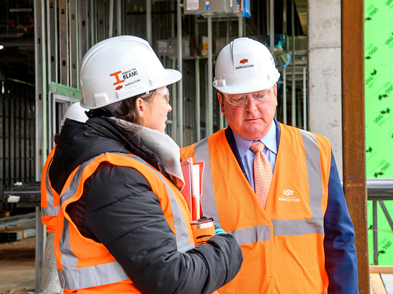 Heidi Williams and Rick Walker on construction site
