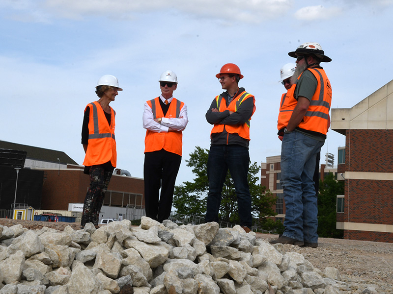 Kayleen Ferguson with crew on construction site