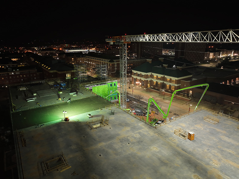 View from the top of the building as workers finist the final concrete pour in early morning