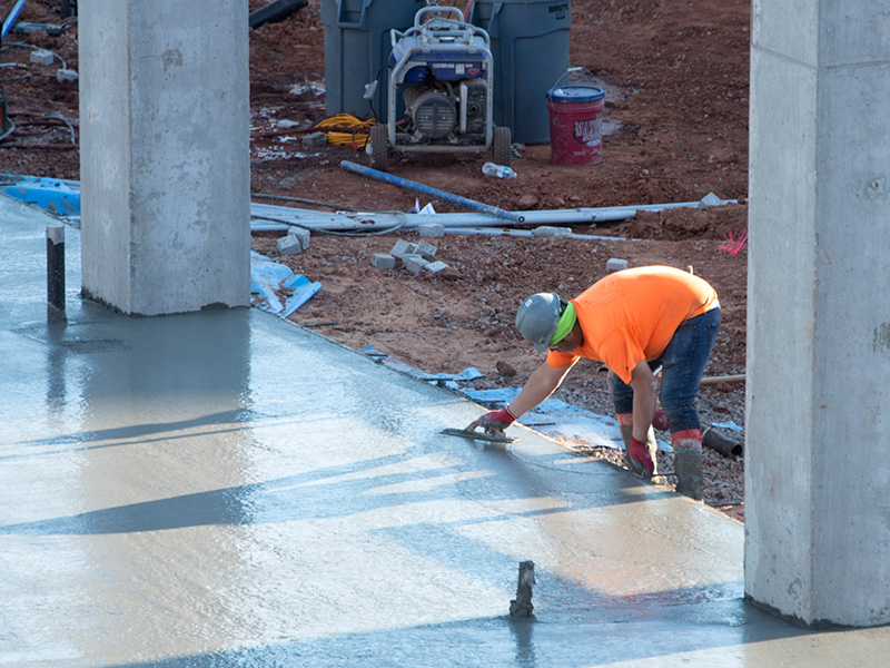 smoothing out concrete foundation