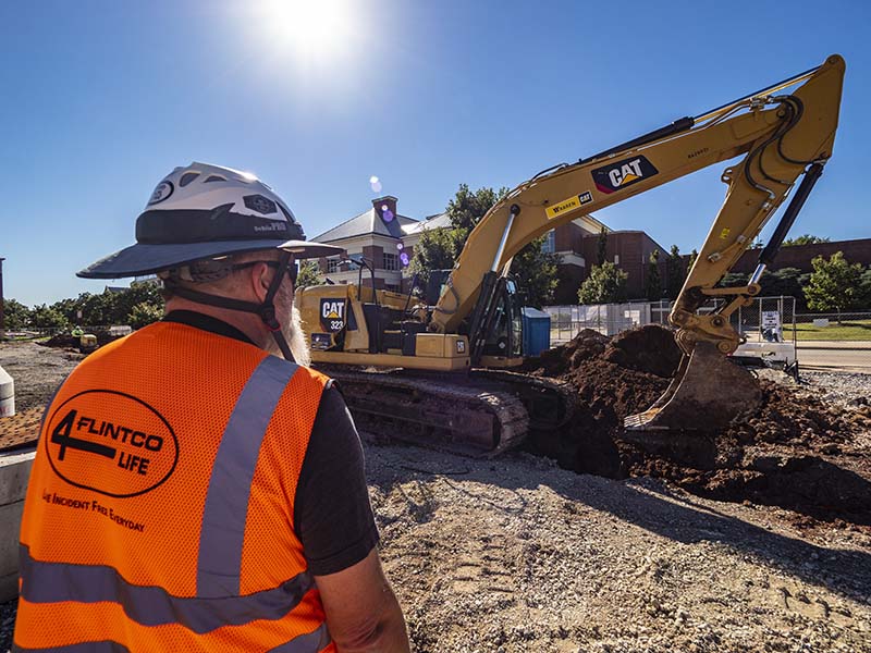 Construction superintendent overseeing work on the site 