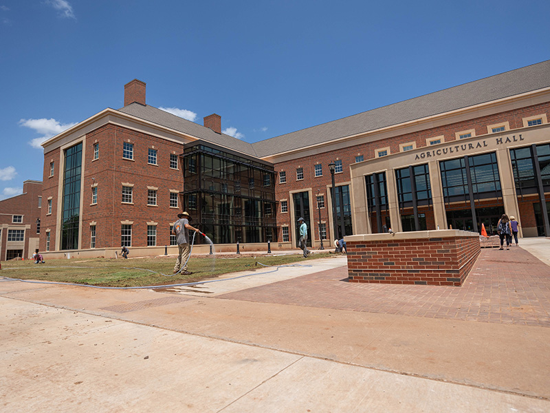 Watering sod outside new building