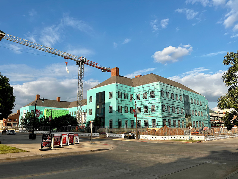 OSU Ag flag flying on New Frontiers construction crane